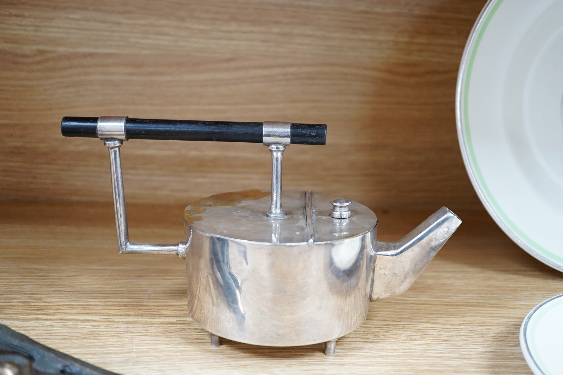 A reproduction modernist Christopher Dresser plated kettle, 24cm wide